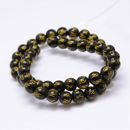 Black Agate Carved Om Mani Padme Hum Gemstone Bead - Crystals and Sun Signs